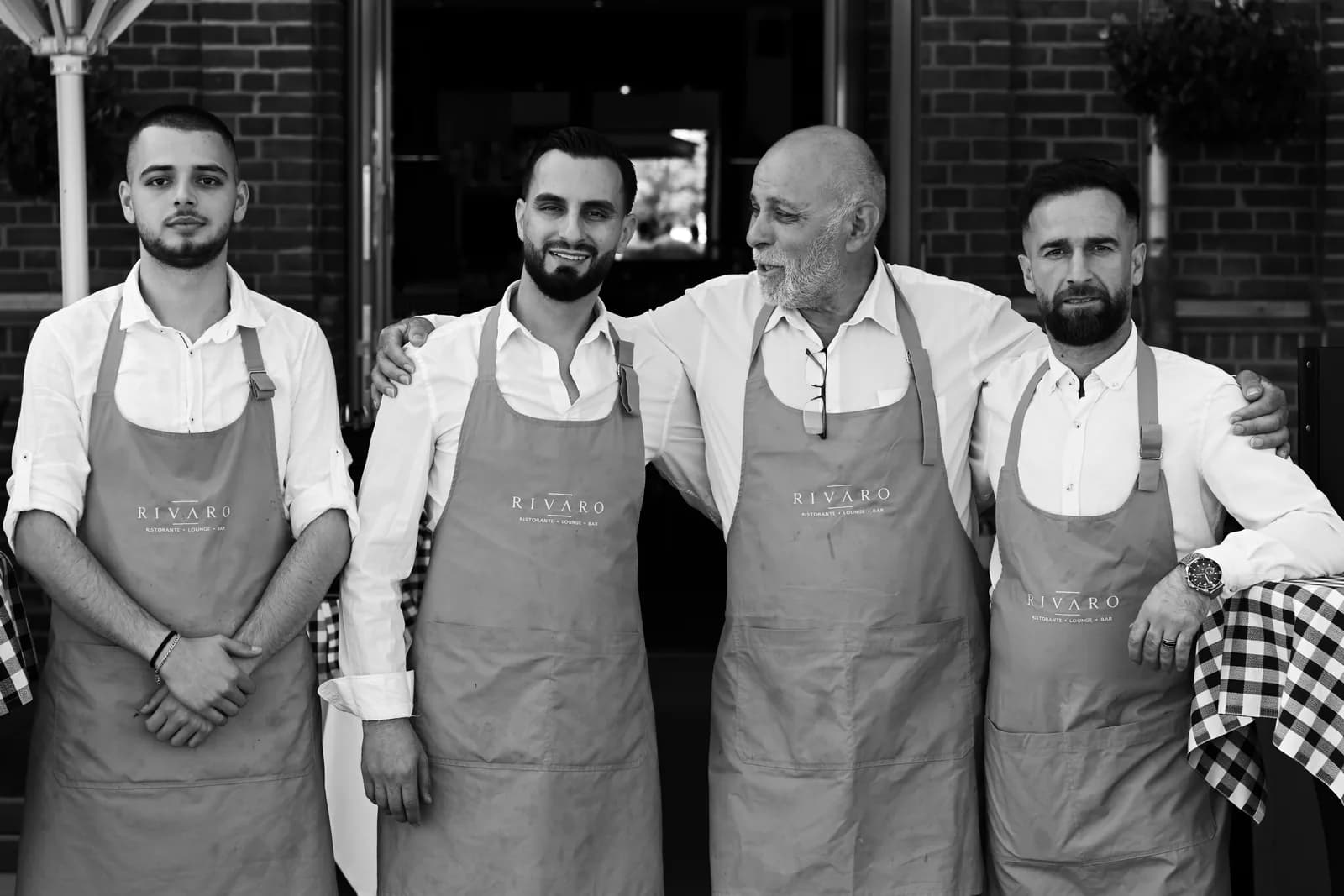 The crew, in black and white